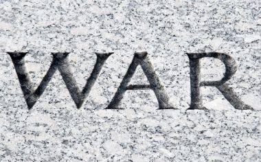 7400342-The-word-War-carved-in-stone-Stock-Photo-war-vietnam